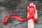 World aids day and national HIV/AIDS and ageing awareness month with red ribbon on woman hand support