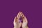 World Alzheimer's day. September 21. International Epilepsy Day. Adult hands holding purple ribbon on purple