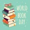 World book day, stack of books with glasses on mint background