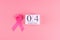 World cancer day with calendar of February 4 and Pink Ribbon supporting people living and illness. Healthcare concept