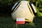 World Championship 2022. Euro 2020. Polish state flag with soccer classic white-yellow and black ball. Huge soccer land. Red and