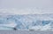 World climate change problems. Melting glacier. Antarctica amazing white frozen blue landscape.