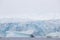 World climate change problems. Melting glacier. Antarctica amazing white frozen blue landscape.