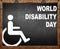 World disability day written on blackboard