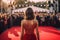 World entertainment star on the red carpet of a festival back view. Generative AI