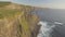 World famous birds eye aerial drone view of the Cliffs of Moher in County Clare, Ireland.