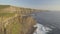 World famous birds eye aerial drone view of the Cliffs of Moher in County Clare, Ireland.