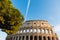 World famous Coliseum under a blue sky in Rome