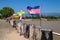 World flags waving at Wat A-Hong Silawas temple, on Mekong river, Tambon Khaisri, Amphoe Bungkan, Nong Khai, Thailand