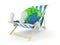 World globe character lying on deck chair