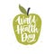 World Health Day lettering handwritten with calligraphic font on green hand drawn apple isolated on white background