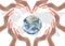 World heart health day concept with collaborative hands protection in heart shape: Elements of this image furnished by NASA