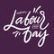 World labour day. Hand drawn vector lettering. Isolated on violet background.