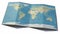 World map drawn on a folded sheet, planisphere leaning on a surface. Physical map