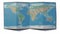 World map drawn on a folded sheet, planisphere leaning on a surface. Physical map