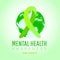 World mental health day concept. Green awareness ribbon with world map shape on green background