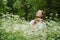 World mental health day, work-life balance, spread positive messages concept. Redhead woman in business suit enjoying nature