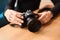 World photography day concept. closeup of hand of young woman with camera