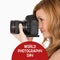 World photography day text on red over happy caucasian woman using camera