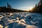 the world\\\'s largest stone river in the snow in the rays of the setting sun