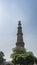 The world\\\'s tallest brick minaret Qutub Minar against the blue sky