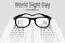 World Sight Day October 12th. Glasses against the background of a Snellen chart for testing visual acuity. Ophthalmology