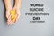 World Suicide prevention Day, hand holding Yellow Ribbon for supporting people living and illness