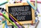 World Teacher`s Day Text. Wooden Frame Blackboard Between School