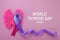 World Thyroid day background. Teal, pink and blue ribbon.