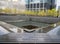 World Trade Center Memorial with engraved names foreground NYC