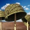 World War II helmets against blue sky. 3D illustration