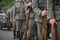 World war II soldiers and armored vehicles enter the city