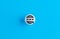 World wide web www symbol on a ball button on blue background
