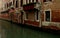 Worn Building Along a Canal in Venice