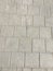 Worn footpath walk textured , gray brick block floor. Grey brown rectangle shape clay tile floor pattern, brick pavement