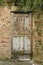 Worn old wooden door Italy