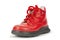 Worn out kiddie-size red lace-ups. Children`s shoes with laces. Old ankle boots for small kid