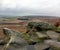 Worn rocks and a view on the pathway leading upto Stanage Edge Rock face.