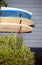 Worn surfboards hanging from trailer house Montauk New York USA