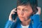 Worried businesswoman during unpleasant telephone conversation