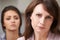 Worried Mother With Teenage Daughter