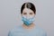 Worried nurse, doctor or scientist portrait behind facemask