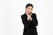 Worried pensive young Asian business woman in suit feeling confused over white isolated background. Thinking and thoughtful