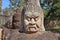 Worrier Face statue Angkor Wat Cambodia ruin historic khmer temple