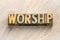 Worship word abstract in wood type