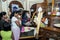 Worshippers pray infront of a statue of Lord Buddha within the Temple of the Sacred Tooth Relic.