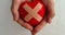 Wounded heart in children hands. Heart disease in children symptoms and treatment