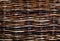 The woven texture of wicker abstract background. Close up.