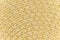 Woven yellow wicker straw background or textur