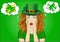Wow. Girl in hat hat St. Patrick`s Day, very surprised. Young woman with her mouth open in shock. Everyone needs to buy gifts